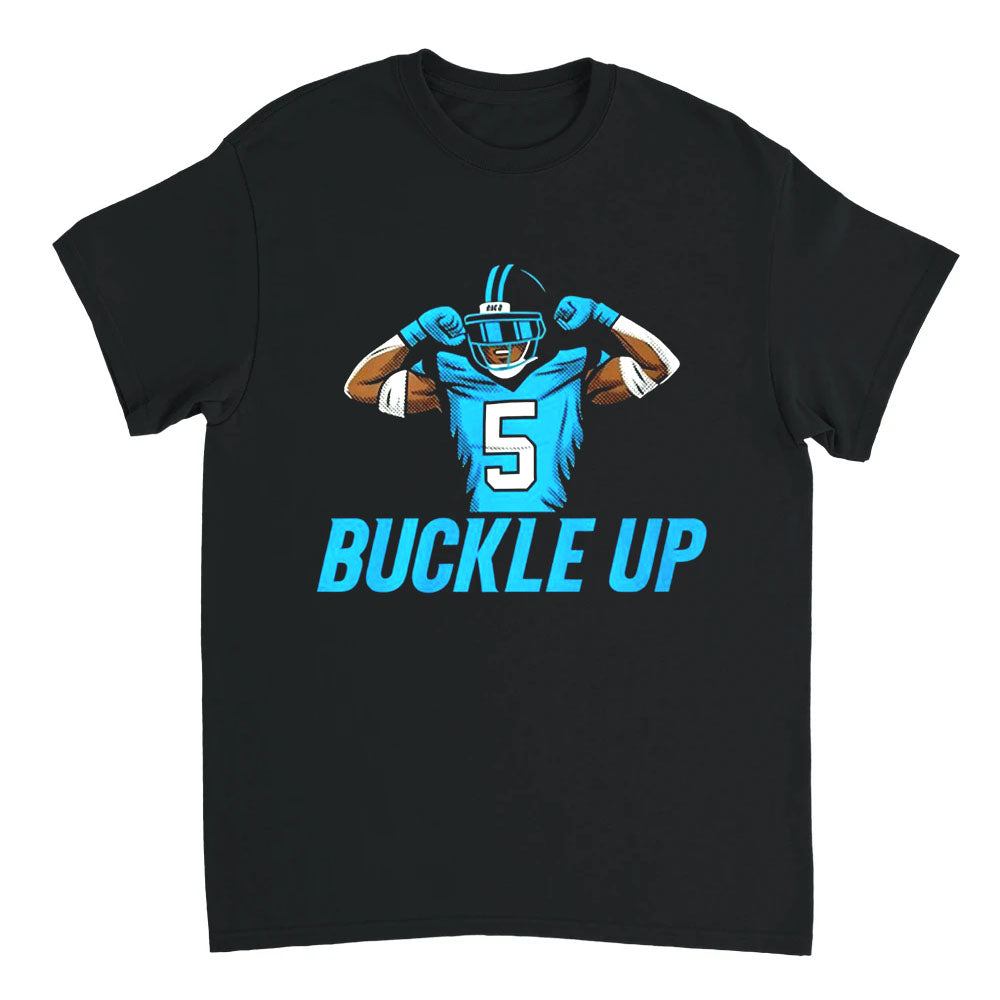 Black t-shirt with a graphic of a football player in a blue uniform and helmet, with 'Buckle Up' text, on a white background.