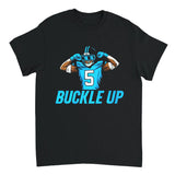 Black t-shirt with a graphic of a football player in a blue uniform and helmet, with 'Buckle Up' text, on a white background.