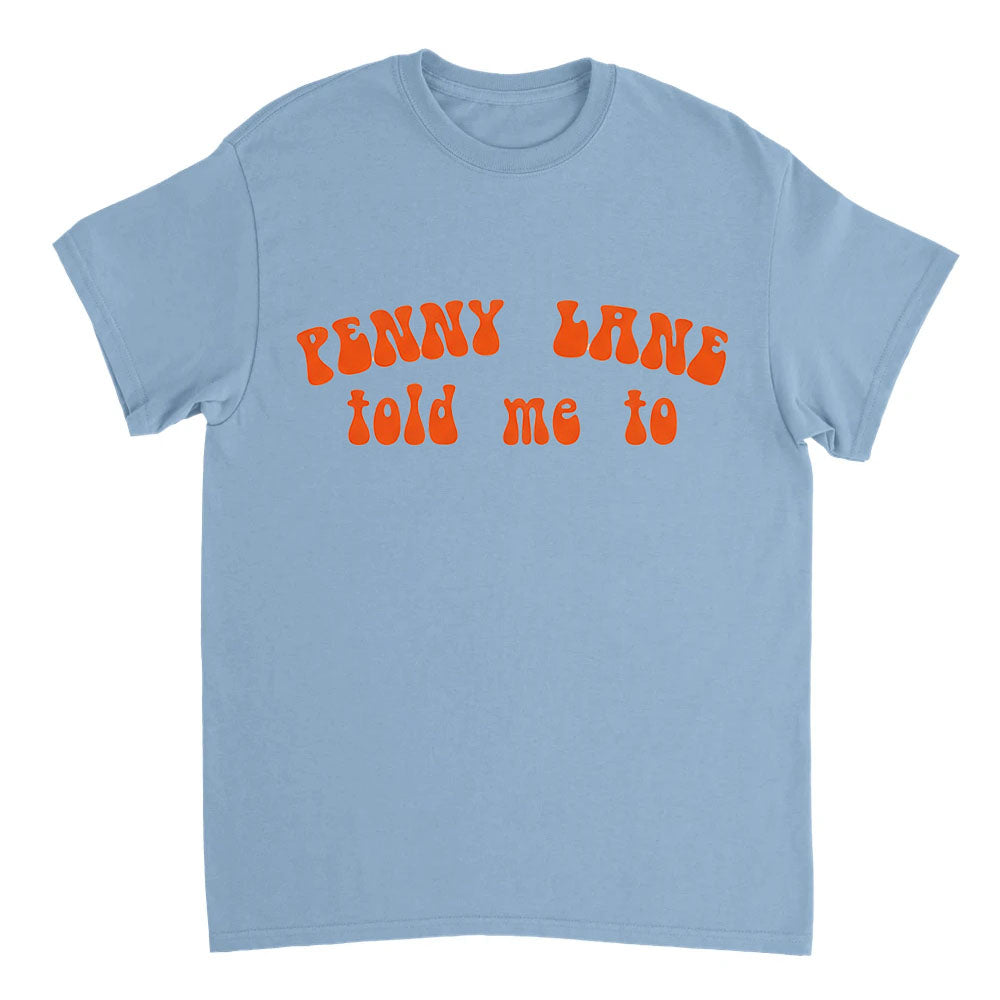 Light blue t-shirt with orange text 'Penny Lane told me to' on a white background