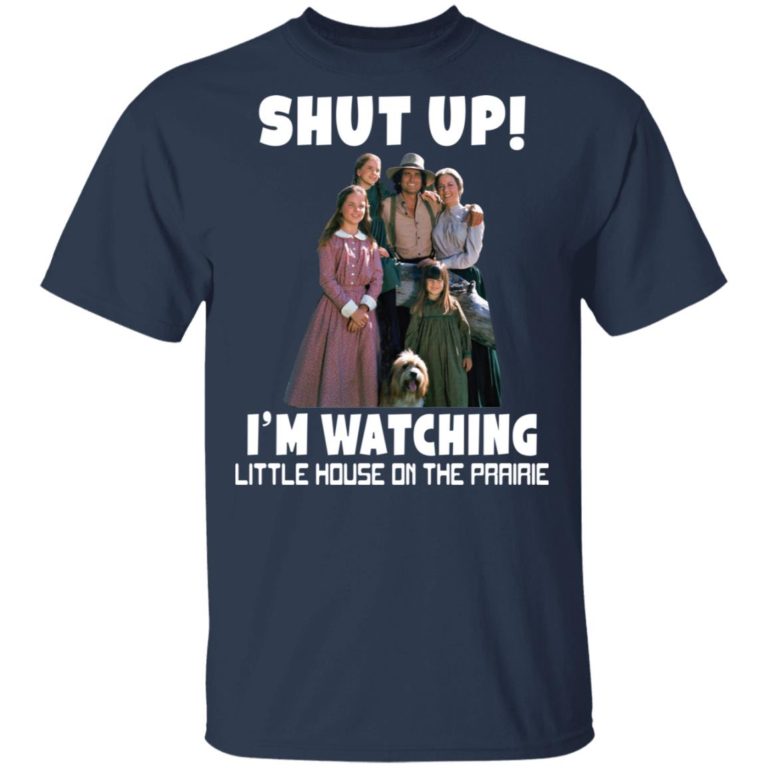 Navy blue t-shirt with 'Shut Up! I'm Watching Little House on the Prairie' text and character graphic.