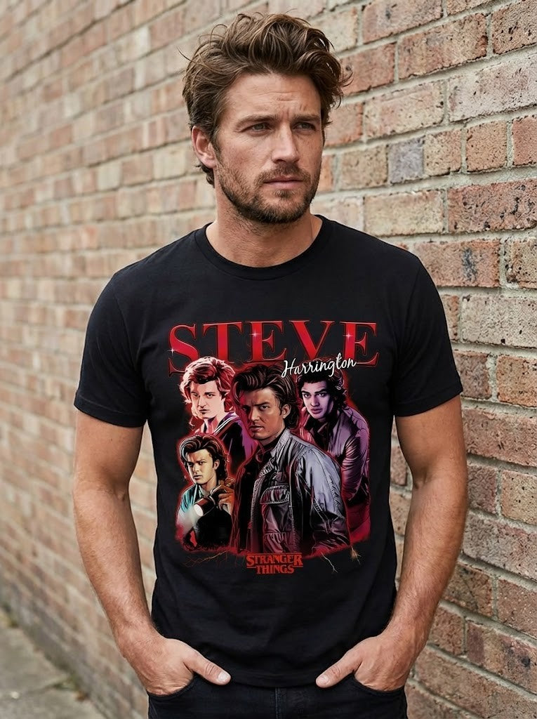 Man wearing a black Steve Harrington Shirt with graphic design against a brick wall.