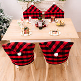 New home decor items for Christmas season, featuring red and black checkered patterns with white fur balls. Chair covers for Christmas atmosphere decoration