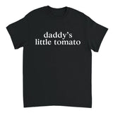Black t-shirt with 'daddy's little tomato' text on a white background