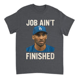 T-shirt with a graphic of a person wearing a blue cap and shirt, with text 'JOB AIN'T FINISHED' on a dark gray background.