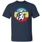 Navy blue t-shirt with a graphic design featuring a person in a sailor outfit and text 'Stop Apartheid' on a white background.