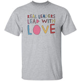 Gray t-shirt with colorful text 'Real Leaders Lead with Love' on a white background