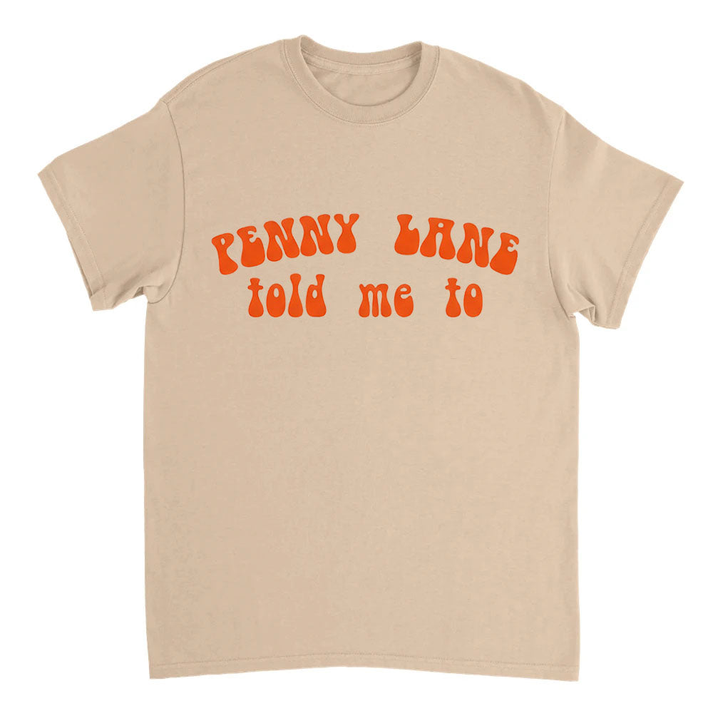 Beige t-shirt with orange text 'Penny Lane told me to' on a white background