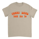 Beige t-shirt with orange text 'Penny Lane told me to' on a white background